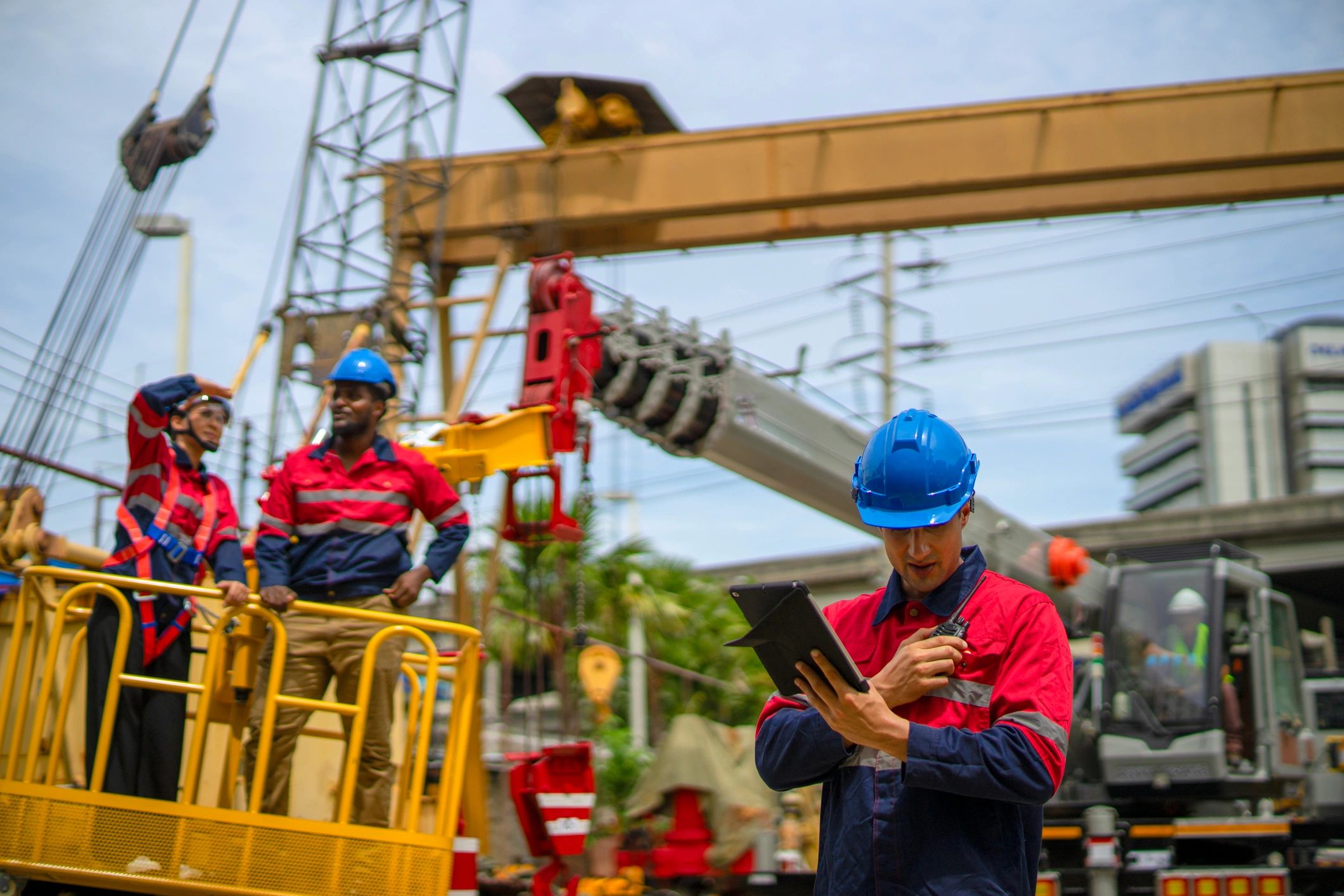 Engineers working together at an industrial construction site